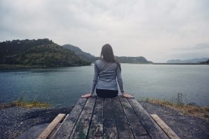 peaceful surrender prayer meditation girl praying dock water