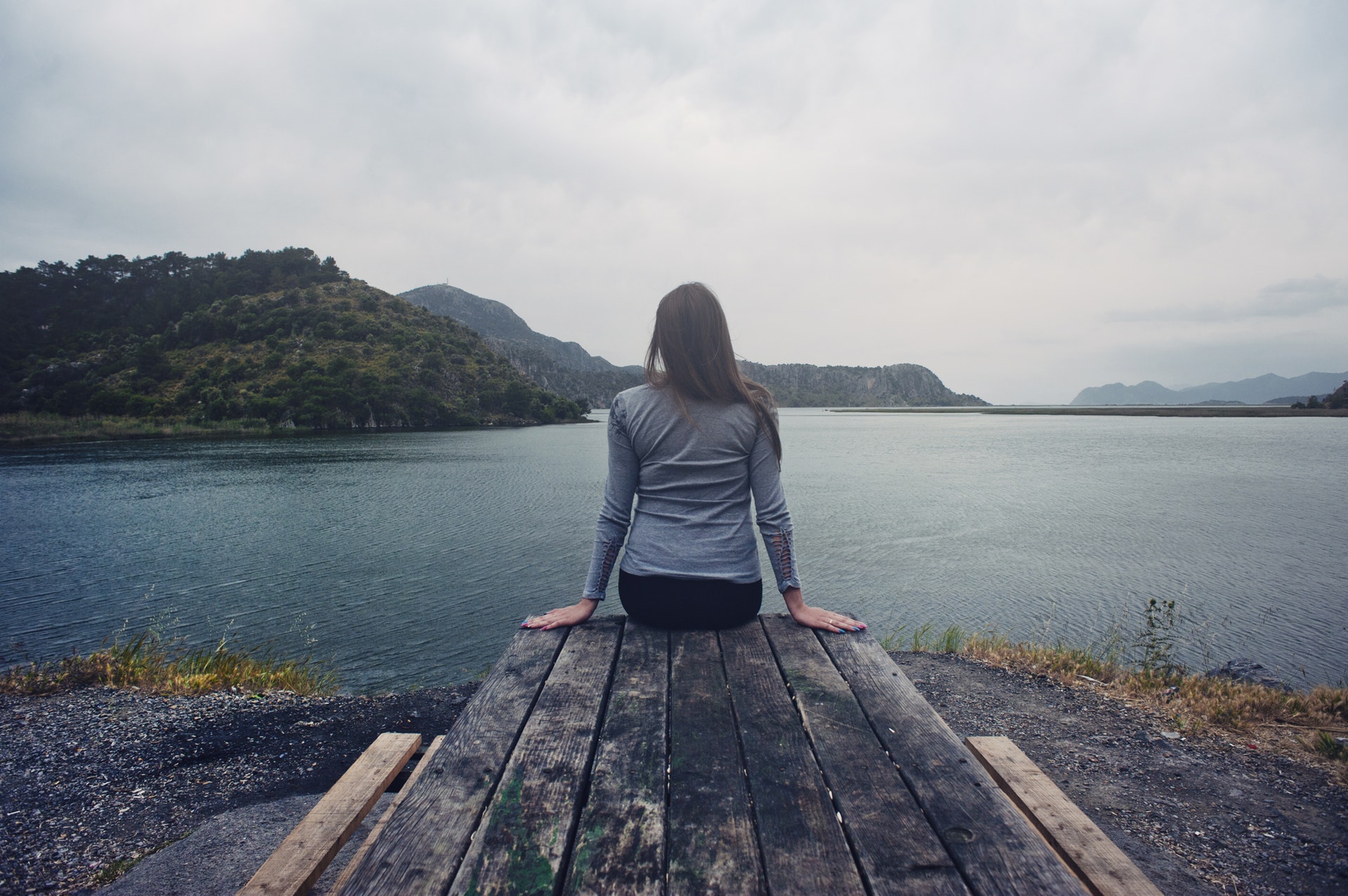 peaceful surrender prayer meditation girl praying dock water
